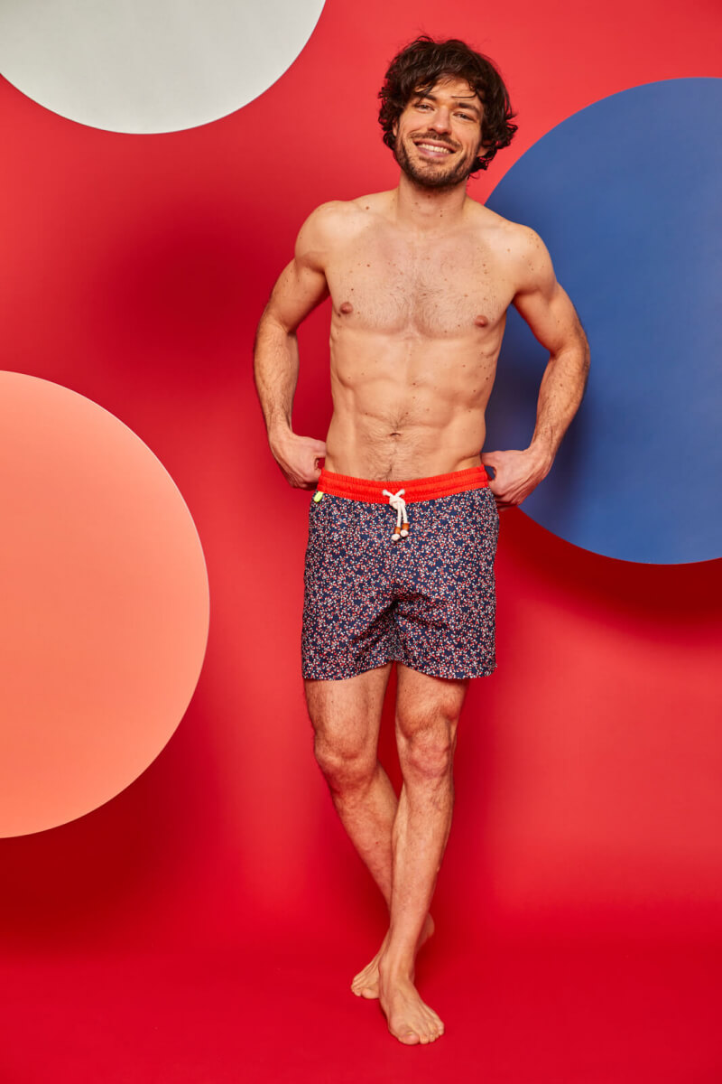 man wearing a swimsuit cherry blossom