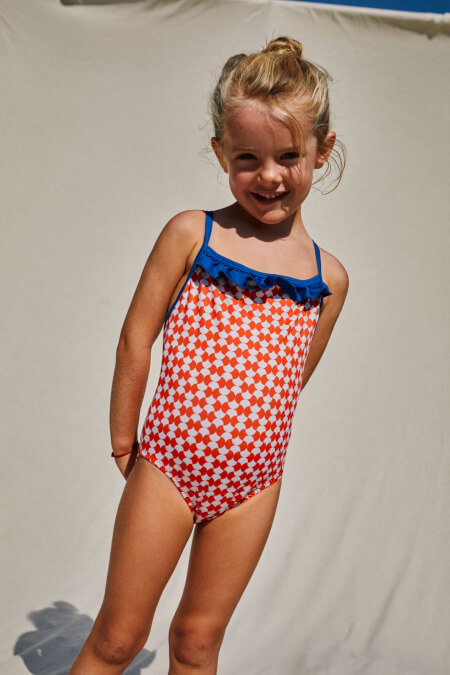 girl wearing a one-piece swimsuit Red Woodstock