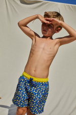Boy wearing a swimsuit with buttoned belt Meno Lemonade