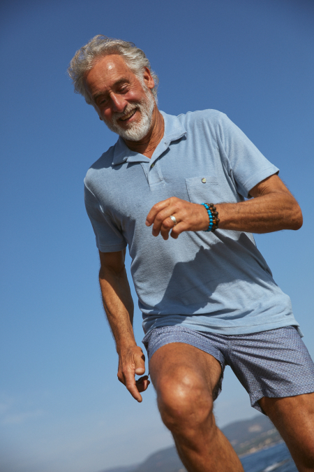 Man wearing a Silver Blue terry cloth polo
