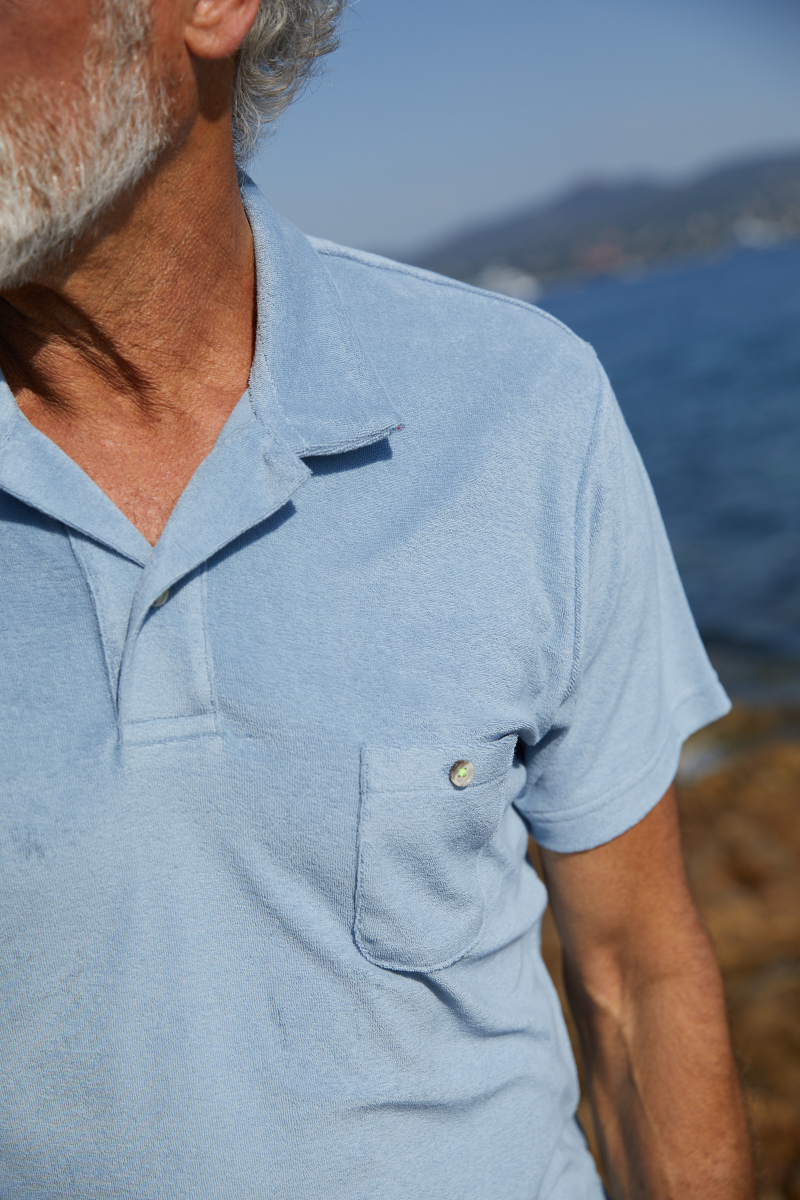 Man wearing a Silver Blue terry cloth polo