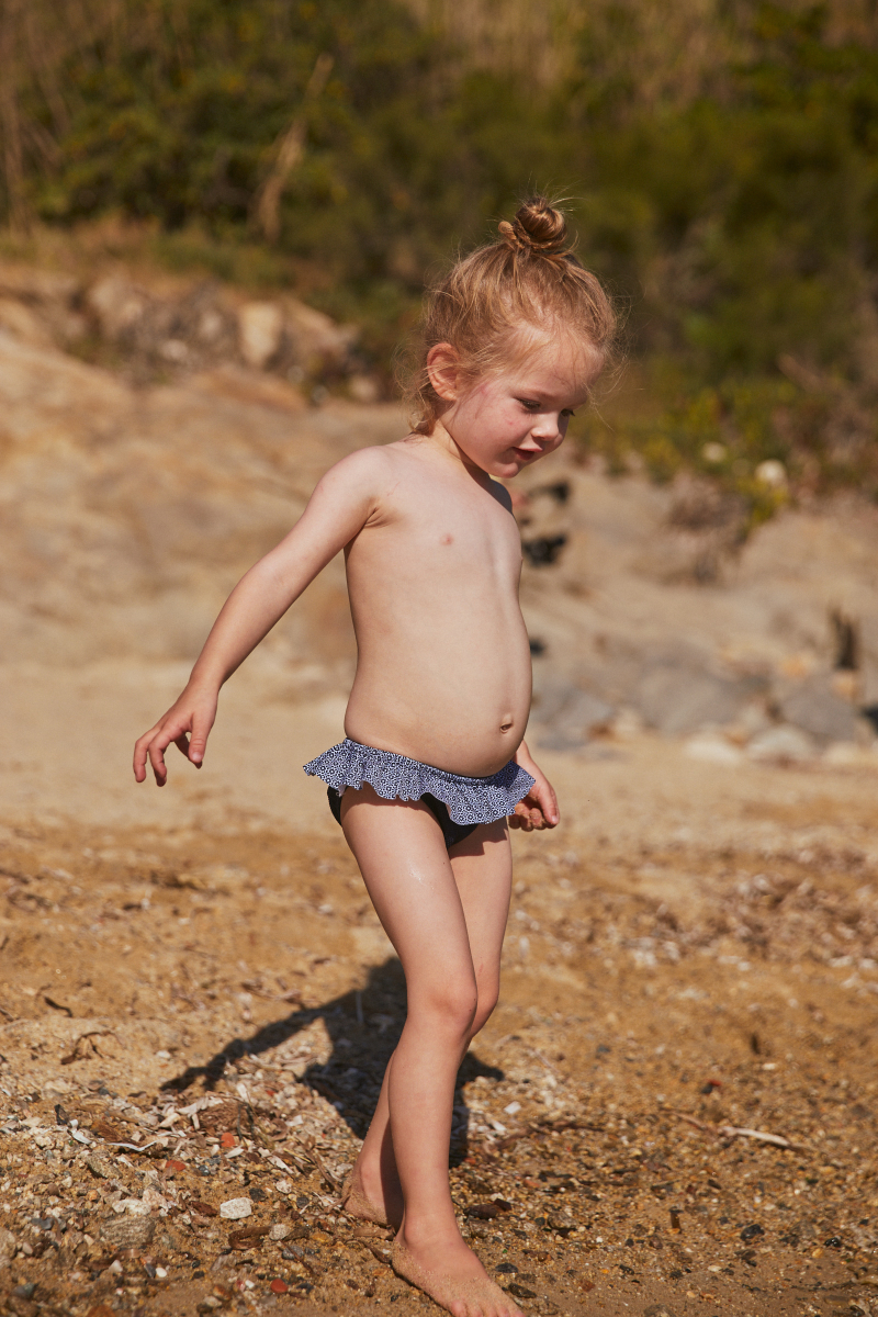 baby girl wearing a Navy Azulejos bikini bottom